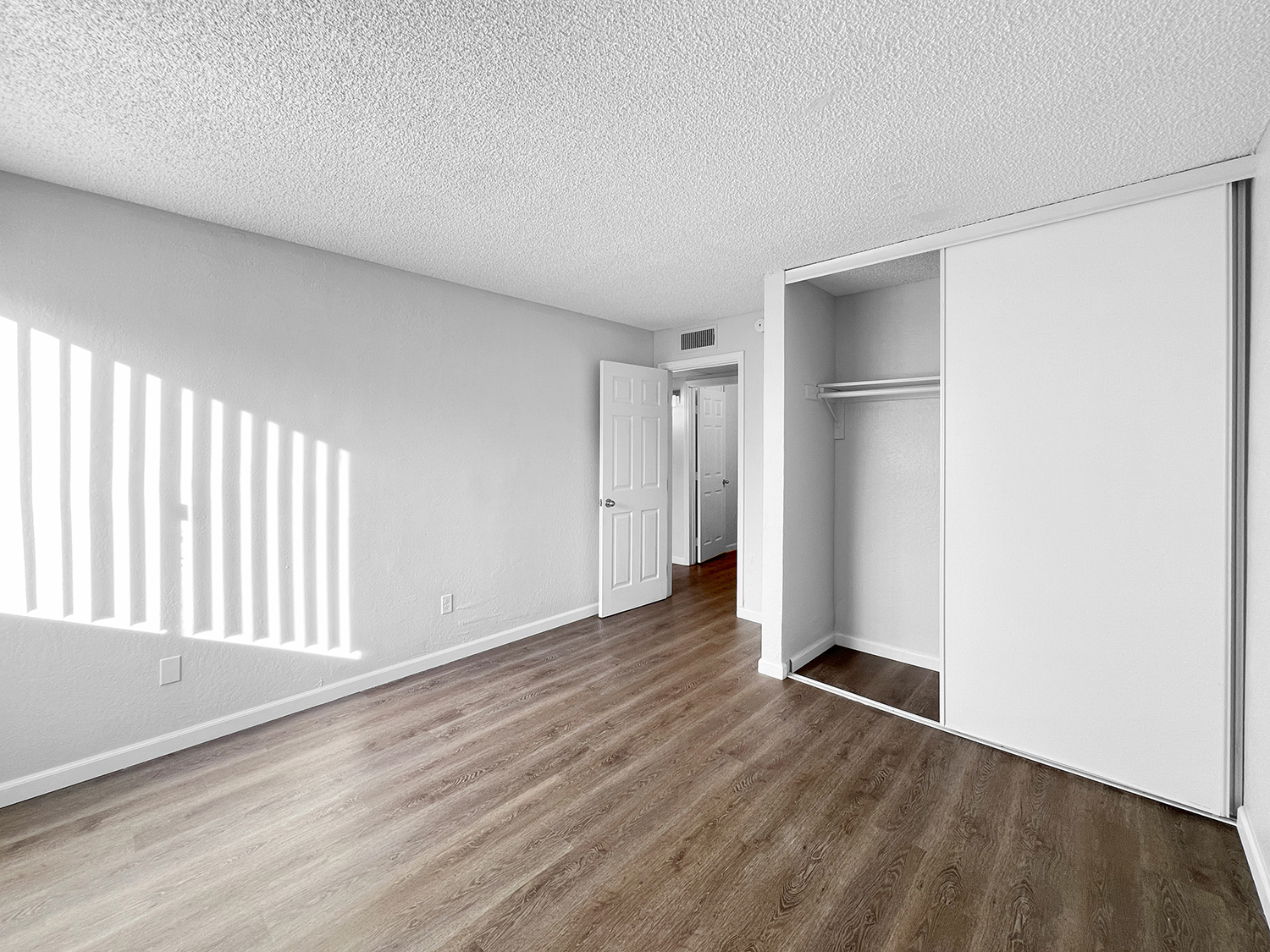Second bedroom with closet at WateringWinds Apartments