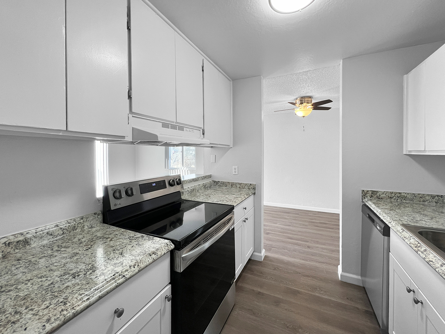 Two bedroom kitchen with oven at WateringWinds Apartments